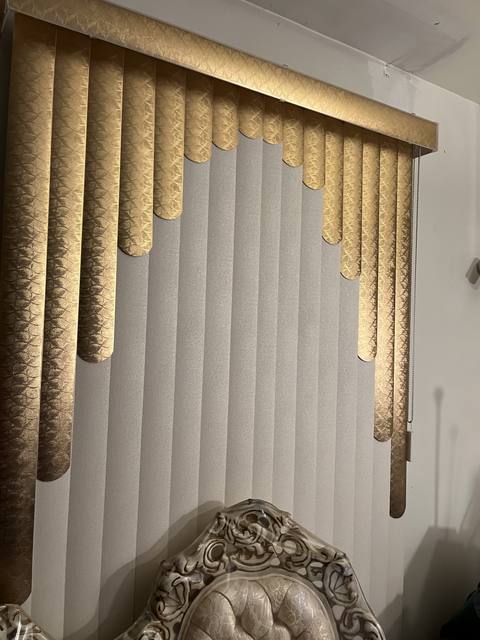 Gold and ivory blinds with a cascading valance